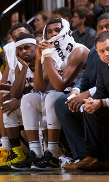 Missouri admits NCAA hoops violations, vacates '13-14 season